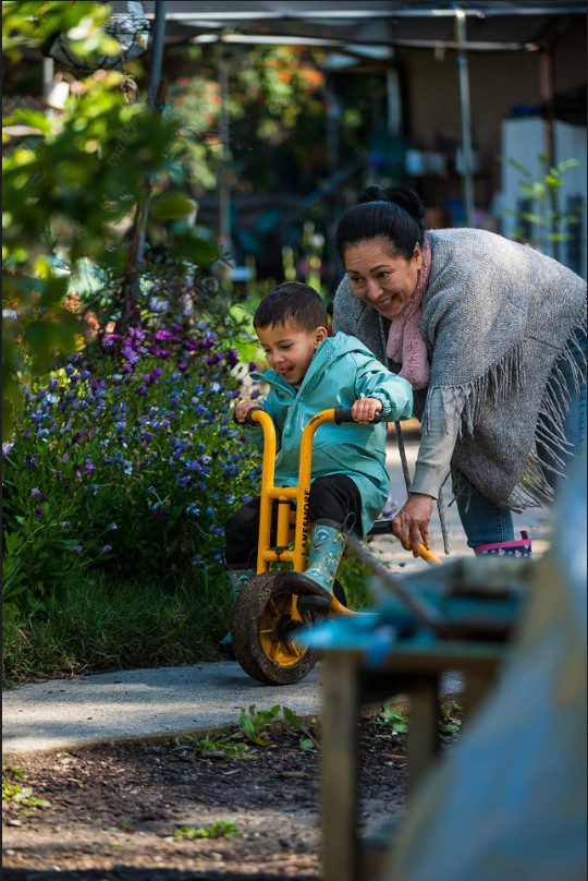 Playful moment in a garden setting